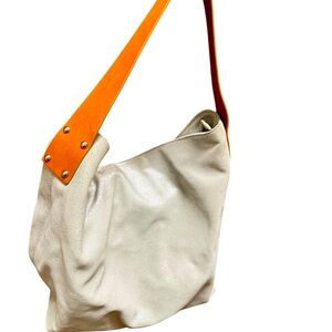 Hispanitas leather hobo bag used once in mint. Condition iridescent light blue